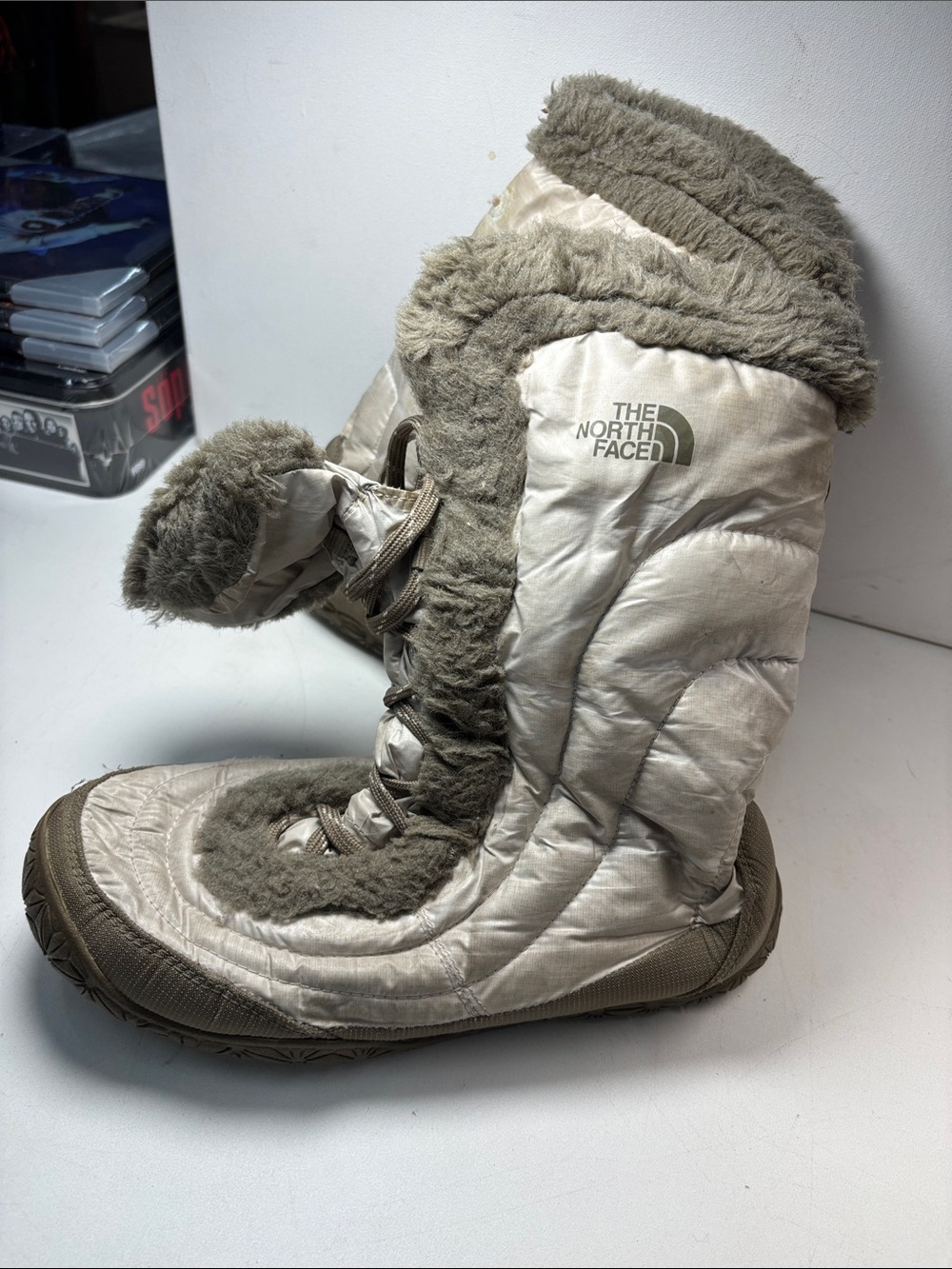 The North Face Quilted Faux-Fur Trim Winter Boots in Taupe